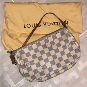 Authentic Louis Vuitton pochette with dust cover.